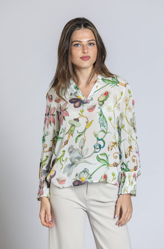 White multi top with smocked cuffs
