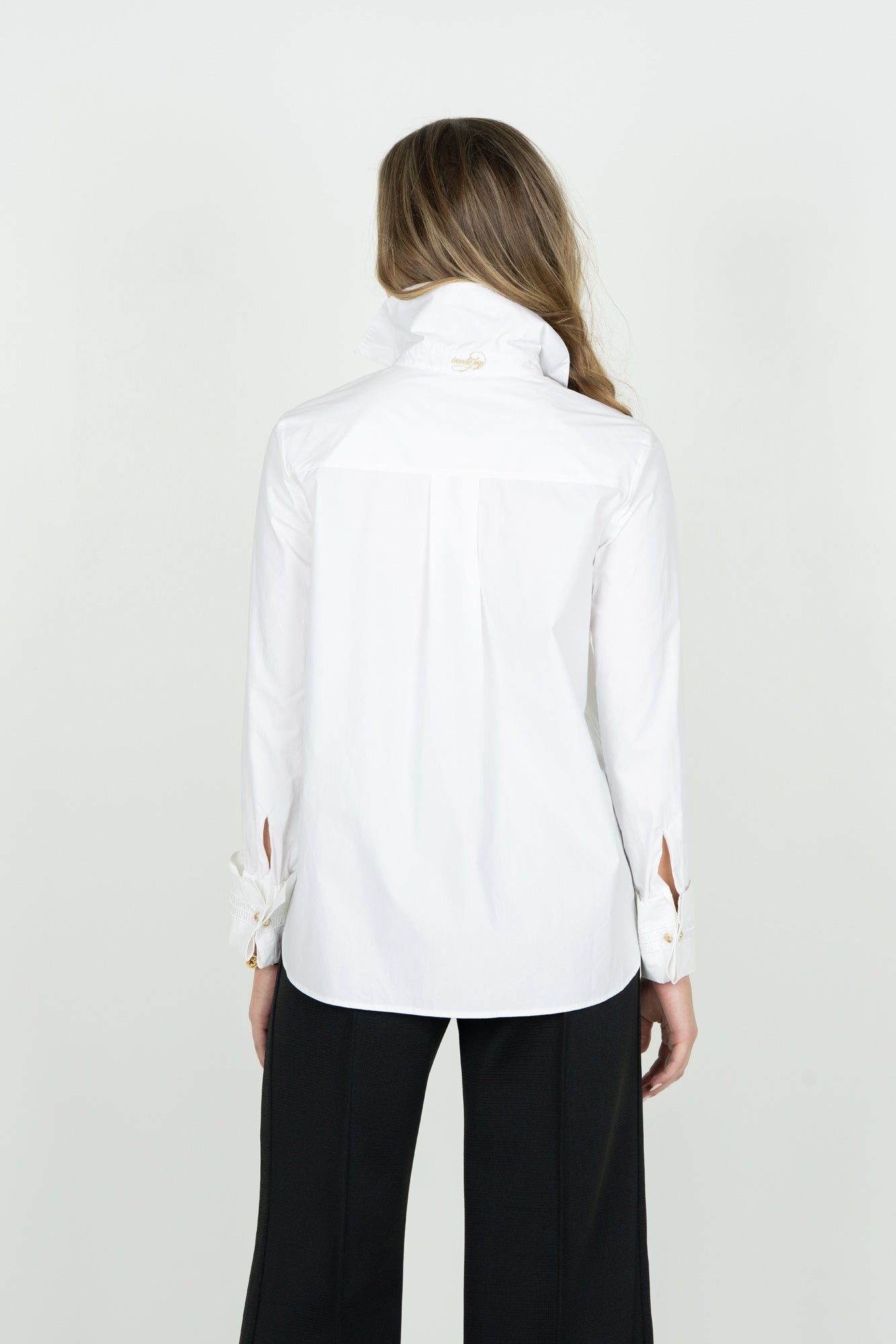 Emily McCarthy Classic Oxford white button-down shirt shown from the back on female model