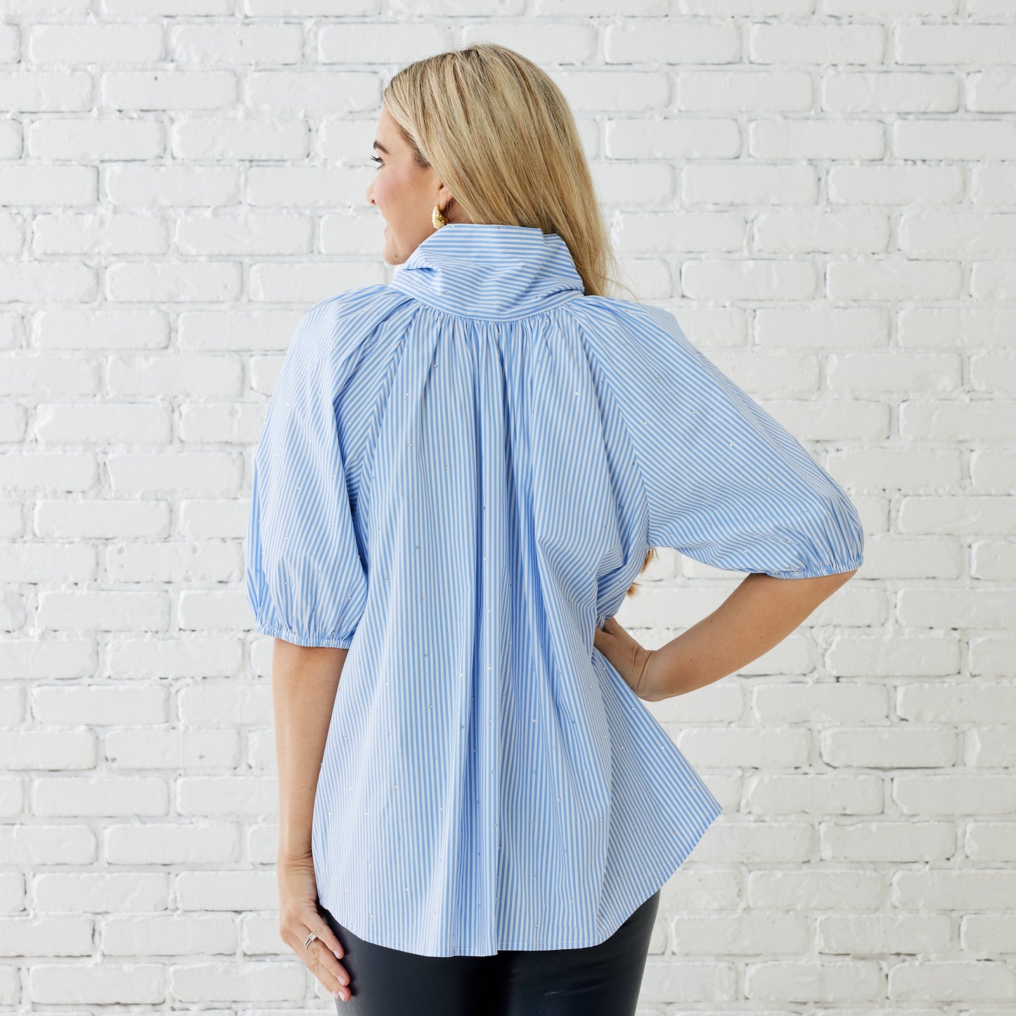 Caryn Lawn Ryan Bow Top in blue and white stripe with puff sleeves, back view